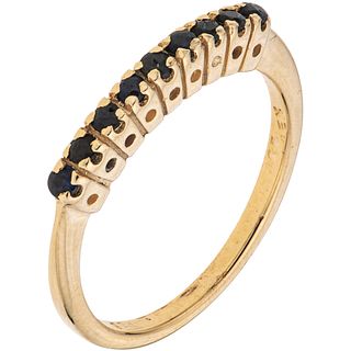 RING WITH SAPPHIRES IN 14K YELLOW GOLD Round cut sapphires ~0.18 ct. Weight: 2.2 g. Size: 6 ¾ | ANILLO CON ZAFIROS EN ORO AMARILLO DE 14K con zafiros 