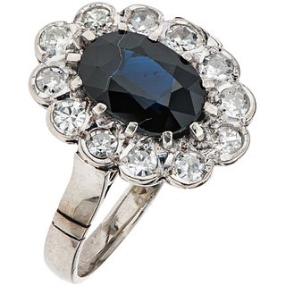 RING WITH SAPPHIRE AND DIAMONDS IN 12K WHITE GOLD Oval cut sapphire ~1.10 ct, 8x8 cut diamonds ~ 0.30 ct. Size: 6 | ANILLO CON ZAFIRO Y DIAMANTES EN O