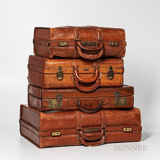 Four Vintage Leather Suitcases
