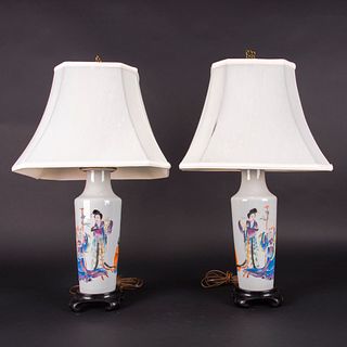 A PAIR OF FAMILLE ROSE 'FIGURAL' VASES, MOUNTED AS LAMPS 