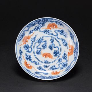 A BLUE AND WHITE IRON-RED 'BAT AND RUYI-SCROLL' DISH, QING DYNASTY, QUANGXU MARK 