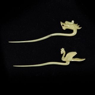 A PAIR OF CARVED JADE 'DRAGON AND PHOENIX' HAIR PINS 