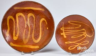 Connecticut redware plate and charger, 19th c.