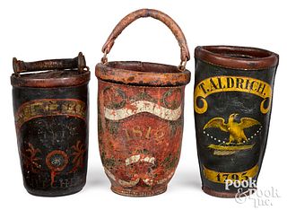 Three painted leather fire buckets, 19th c.
