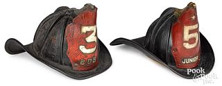 Two Cairns & Brothers painted leather fire helmets