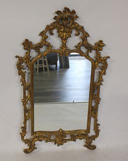 Vintage Rococo Carved And Giltwood Mirror.