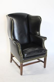 Vintage And Quality Upholstered Wing Back Chair.