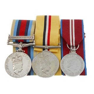 Operational Service Medal 2000, Afghanistan clasp, Iraq Medal, named to '25159097 LCPL CJ Kirby R Si