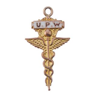 A 1920's 9ct gold U.P.W fob medal, the winged sword with enamelled plaque and personal inscription t