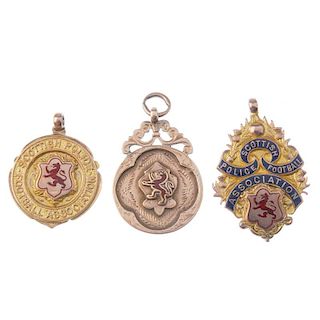 Three 9ct gold Scottish Police Football Association fob medals each engraved to the reverse, togethe