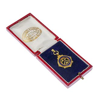 A 9ct gold and enamel Congleton & District Football League medal, engraved to the reverse 'Winners 1