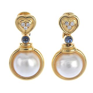 A pair of 18ct gold mabe pearl, diamond and sapphire ear pendants. Each designed as a mabe pearl co