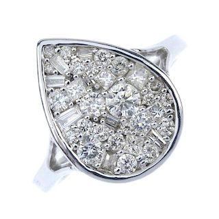 A diamond cluster ring. Of pear-shape outline, the vari-cut diamond cluster, to the plain band. Esti