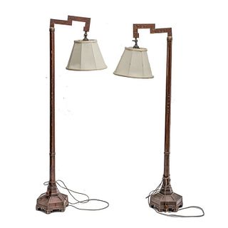 Pair of carved wood pole lamps Circa 1910