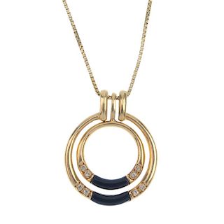 An onyx and diamond pendant. Designed as two concentric tapered circles, each with onyx curved panel