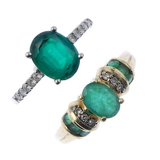 Two diamond and gem-set rings. To include an oval-shape emerald ring with diamond and emerald sides,