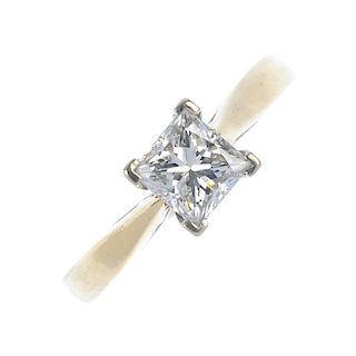 A diamond single-stone ring. The square-shape diamond, to the tapered shoulders and plain band. Diam