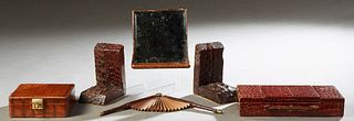Group of Five Reptilian Items, 20th c., consisting of a crocodile fitted pipe box; an alligator skin folding fan; a pair of alligator paw bookends, a 