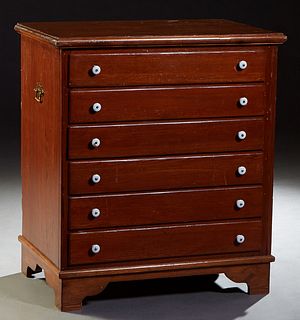 American Carved Pine Map or Print Chest, 20th c. the stepped ogee top over six shallow drawers, on a plinth base with bracket feet, H.- 36 3/4 in., W.
