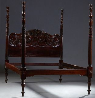 French Provincial Carved Mahogany Four Poster Bed, early 20th c., the arched scroll and leaf carved headboard within turned posts to wood rails and sc