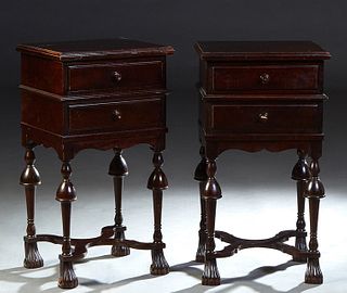 Pair of French Carved Beech Nightstands, 20th c., the stepped rectangular top over a bank of two drawers, on a turned tapered urn form support, joined