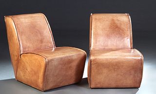 Pair of "Bruno" Leather Side Chairs by Restoration Hardware, Art Deco Brown Leather and Plywood Lounge Chairs, 20th c., the curved canted back over a 