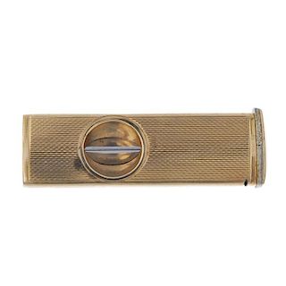 A 9ct gold cigar cutter. With engine turned case. Hallmarks for Birmingham, 1964. Length 5.5cms. Wei