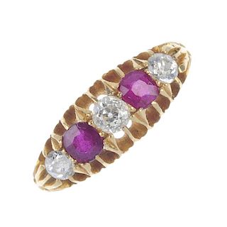 An early 20th century 18ct gold ruby and diamond five-stone ring. The alternating circular-shape rub