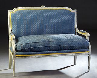 French Louis XVI Polychromed Beech Settee, 20th c., the floral carved crest rail over an upholstered back and arms flanking a removable seat cushion, 