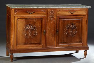 French Art Nouveau Carved Walnut Marble Top Server, early 20th c., the green and white striated marble over two fielded panel frieze drawers, flanking
