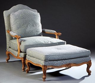 French Louis XV Style Carved Mahogany Fauteuil, 20th c., the arched canted upholstered back flanked by scrolled upholstered arms, and a removable bowe