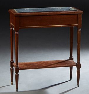 French Louis XVI Style Carved Mahogany Floor Planter, 20th c., the rectangular top with a zinc planter, on turned tapered legs to a bottom shelf, on t