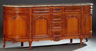 French Louis XV Style Carved Cherry Marble Top Sideboard, 20th c., the highly figured tan marble over a central bank of four drawers, flanked by friez
