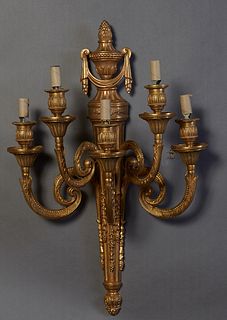 Large Louis XVI Style Five Light Gilt Bronze Sconce, early 20th c., the flame topped tapered torch form back plate issuing five curved scrolled arms w