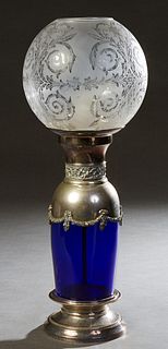 French Silverplate and Cobalt Glass Banquet Lamp, early 20th c., with a large etched glass ball shade, H.- 23 1/2 in., Dia.- 9 1/2 in