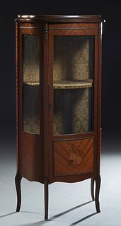 French Louis XV Style Inlaid Mahogany Ormolu Mounted Vitrine, early 20th c., the stepped bowed top over a center door with a curved glass upper panel 