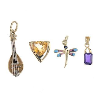 A selection of five mostly gem-set pendants. To include a 9ct gold graduated pink sapphire, topaz an