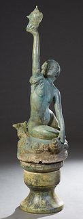 Cast Stone Fountain Figure, 20th c., of a mermaid holding a shell, on a large cast stone urn base, H.- 75 1/2 in., W.- 24 in., D.- 20 1/2 in.