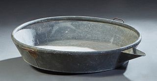 Zinc and Iron Grape Stomping Basin, early 20th c., with two iron handles and one side supports, H.- 7 1/2 in., W.- 39 1/2 in., D.- 38 1/2 in.