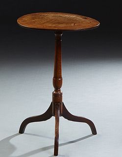 Diminutive English Carved Oak Pedestal Lamp Table, late 19th c., the circular top on a turned tapered support to tripod cabriole legs. H.- 26 1/4 in.,