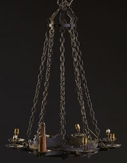 French Provincial Wrought Iron Eight Light Chandelier, early 20th c., with iron chain supports to a circular iron ring with fleur-de-lis mounts with c