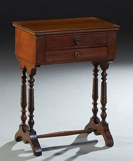 French Carved Mahogany Work Table, c. 1900, thee rectangular top over a bank of two drawers, on turned supports joined by a rectangular stretcher, H.-