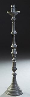 Large French Pewter Floor Candlestick, 19th c., the candle cup and bobeche on a knopped cylindrical support, on a stepped circular base, H.- 49 1/2 in