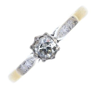 A mid 20th century 18ct gold diamond single-stone ring. The brilliant-cut diamond, to the bi-colour,