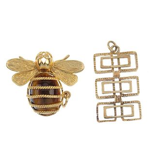 Two 1970s 9ct gold pendants. To include a tiger's-eye bee pendant, together with a vari-texture geom