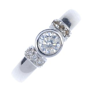 An 18ct gold diamond single-stone ring. The brilliant-cut diamond collet, to the brilliant-cut diamo