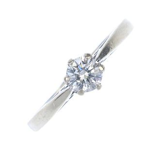 An 18ct gold diamond single-stone ring. The brilliant-cut diamond, to the tapered band. Diamond weig