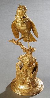 Ferdinand Pautrot (1832-1874, French), "Bird on a Tree Stump," 19th c., gilt bronze, impressed signature on proper left top of integral base, H.- 11 1