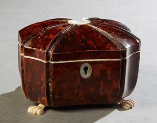 Tortoise Shell and Bone Tea Caddy, 19th c., of oval octagonal form, the domed segmented lid with a central mother-of-pearl medallion, over octagonal c