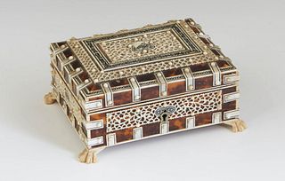 Diminutive Tortoise Shell and Bone Dresser Box, 19th c., the lid with a pierce carved bone panel with a scrimshaw bird, over pierced side panels with 